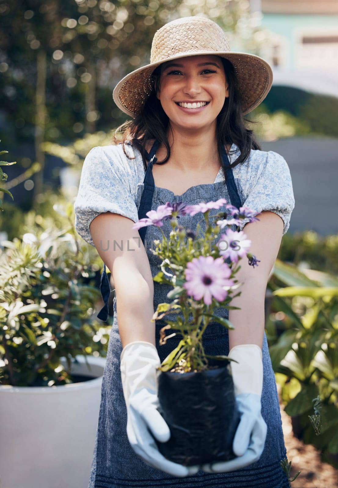 Flowers, portrait and happy woman gardening with pot plants for growth, development and nursery service. Gardener, florist and eco friendly farming for nature, horticulture and floral sustainability.