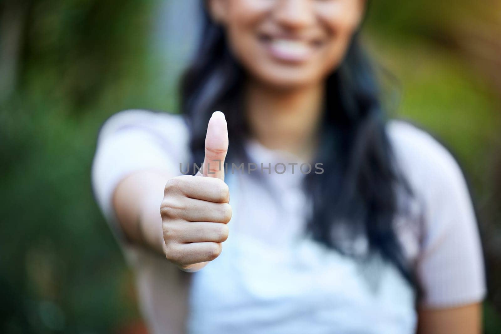 Hand, woman with thumbs up and agreement for support or success, feedback or review with deal outdoor. Praise, pride and excellence with promotion, yes or like emoji with OK, vote and subscribe.