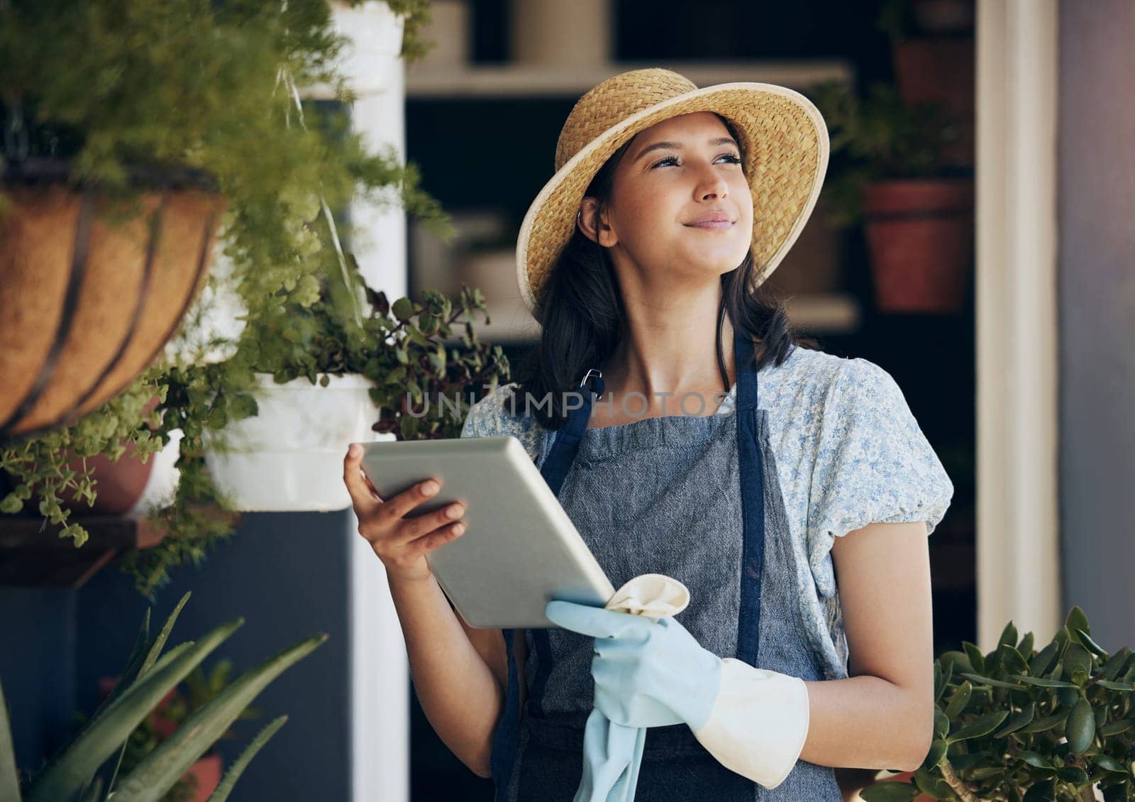 Florist, tablet or woman in business thinking for growth, development ideas and agriculture service. Gardener, nursery and girl farming for plants, horticulture research and floral results online.