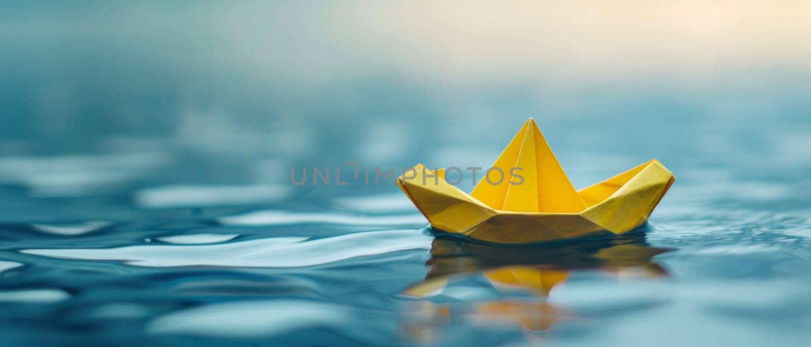 An origami boat basks in soft light, creating a serene scene with its golden hue on tranquil waters