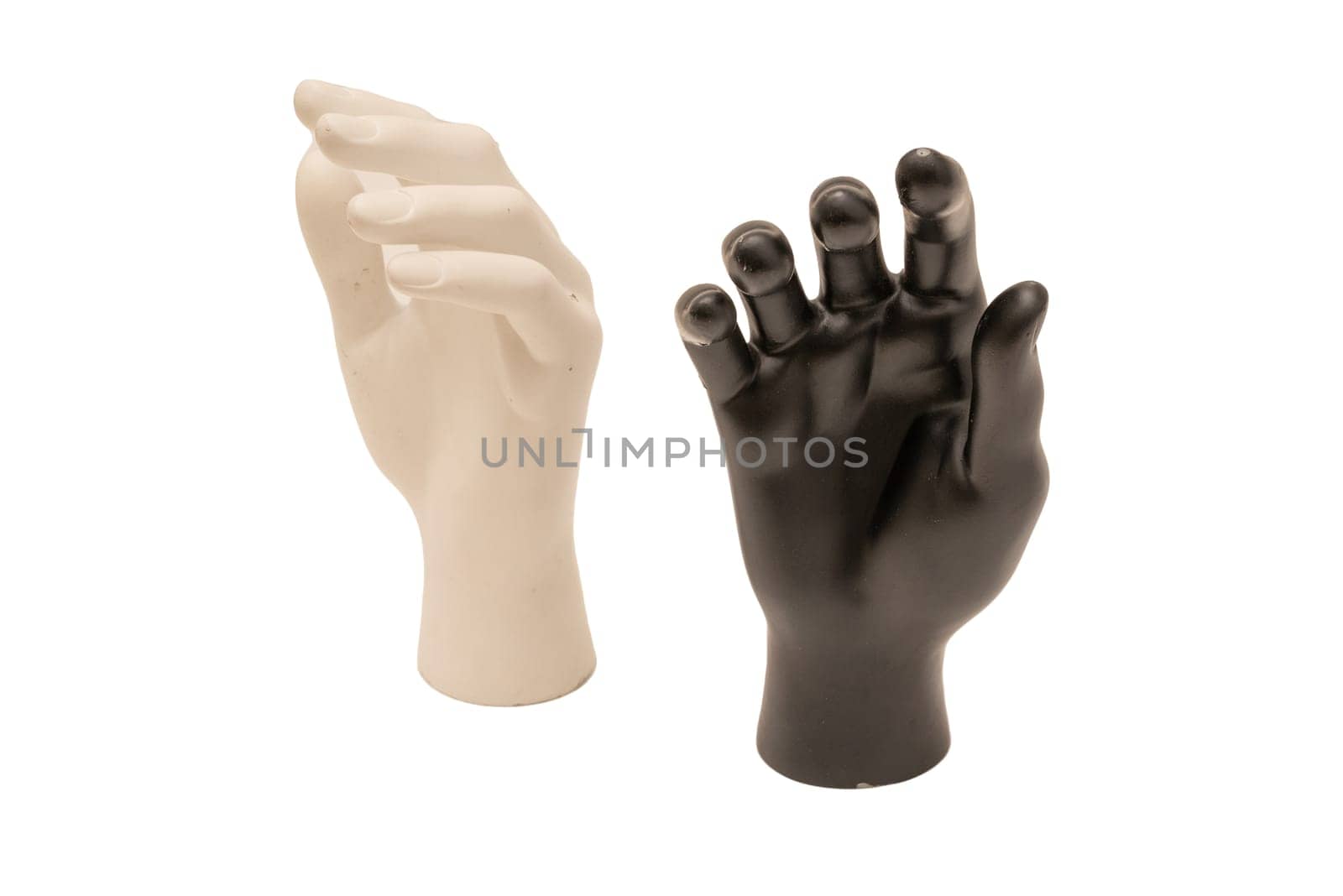 Old shabby mannequin hands on a white background by zartarn