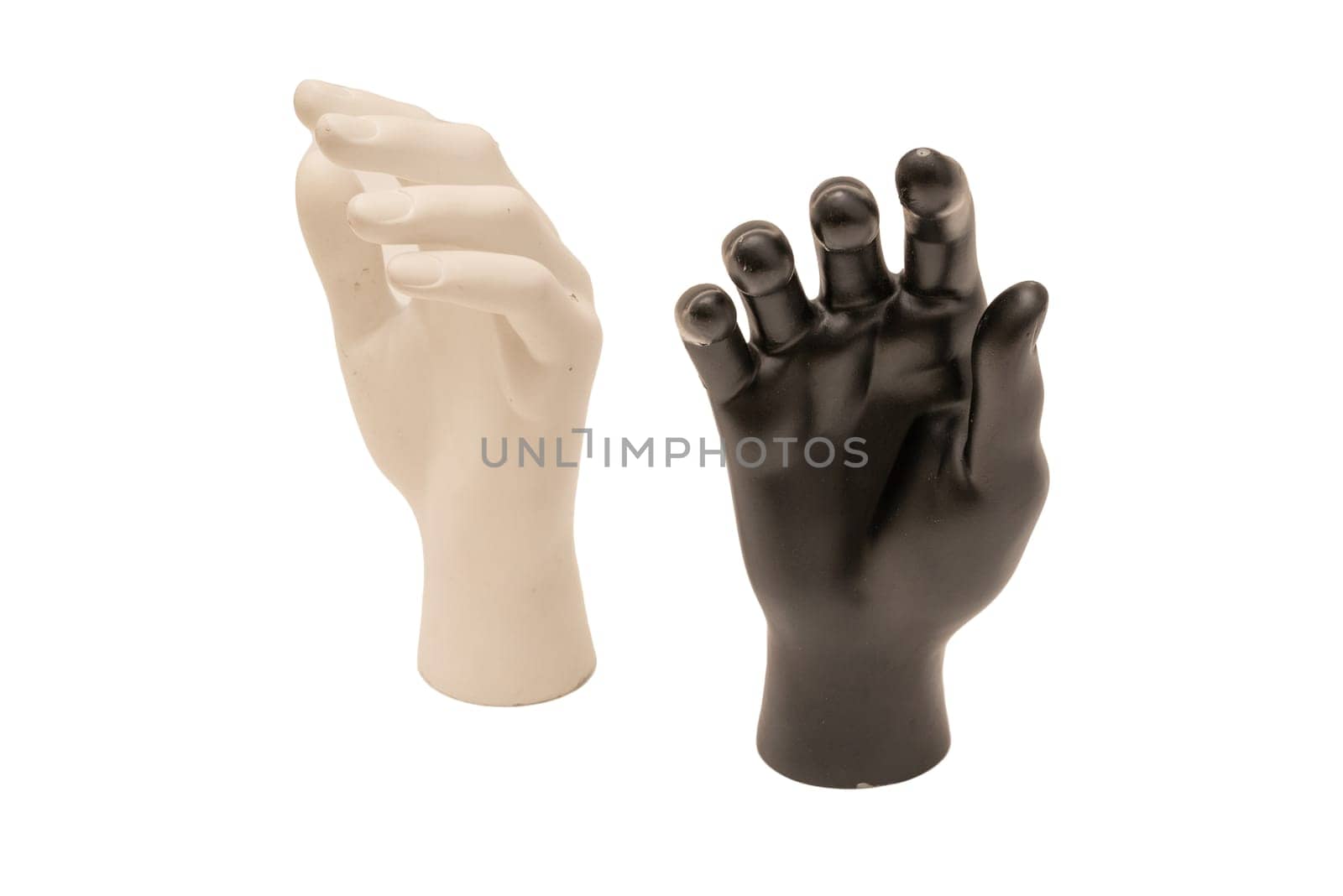 Old shabby mannequin hands on a white background