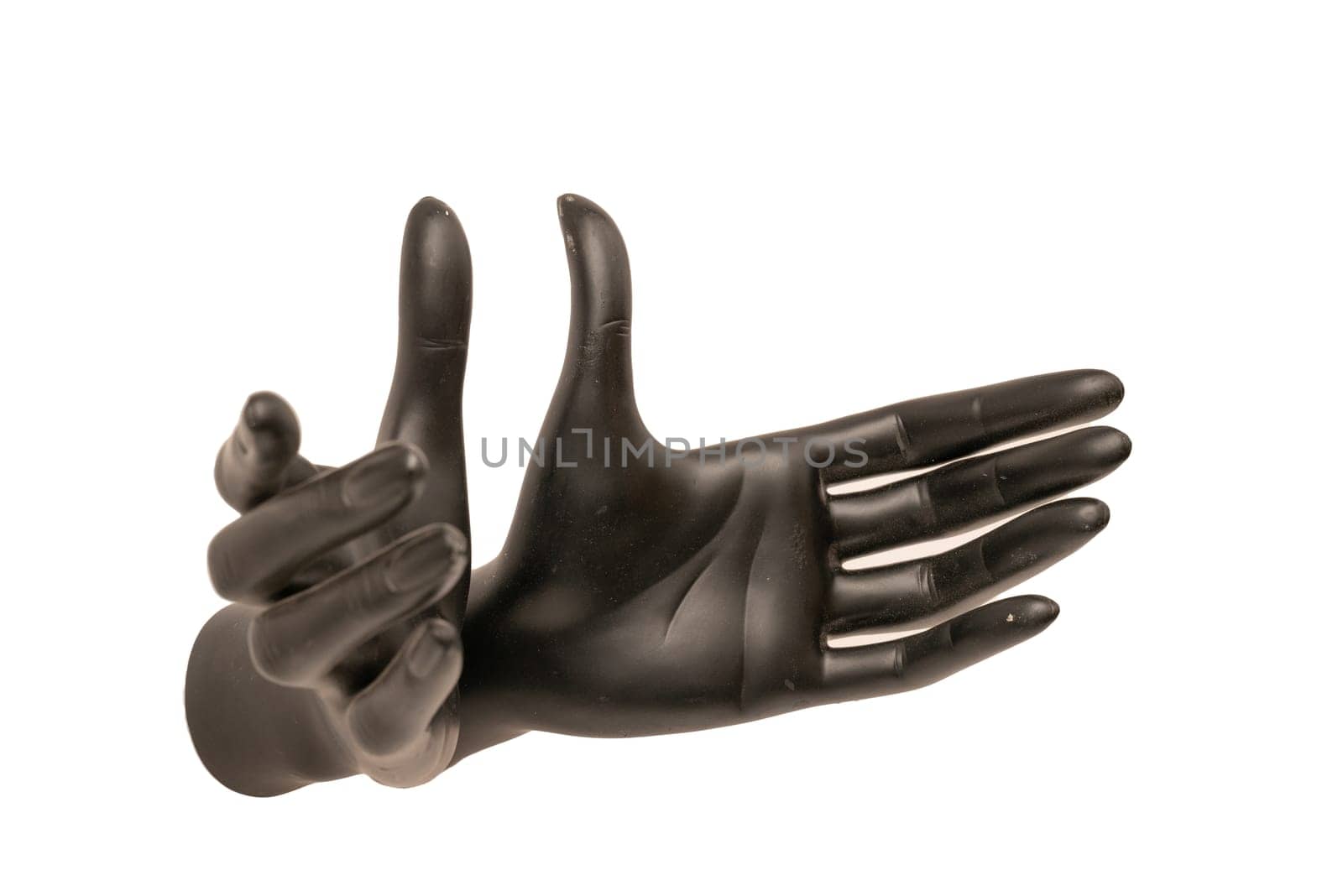 Old shabby mannequin hands on a white background
