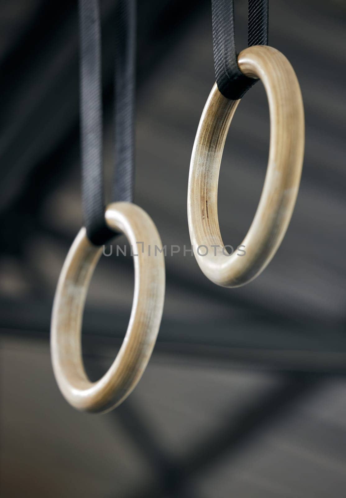 Gym, equipment and rings for exercise, gymnastic and sports for strength. Functional fitness, acrobat and athletic for apparatus and training for health and wellness, workout and club for hanging.