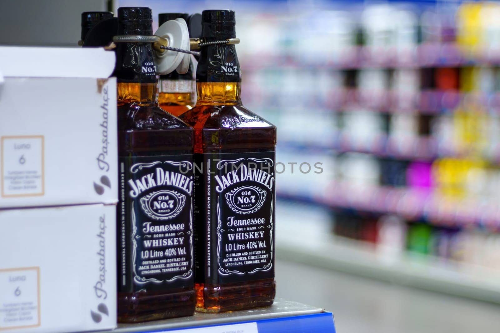 Tyumen, Russia-March 02, 2024: Bottles of Jack Daniels Tennessee Whiskey are showcased prominently on a retail shelf. by darksoul72