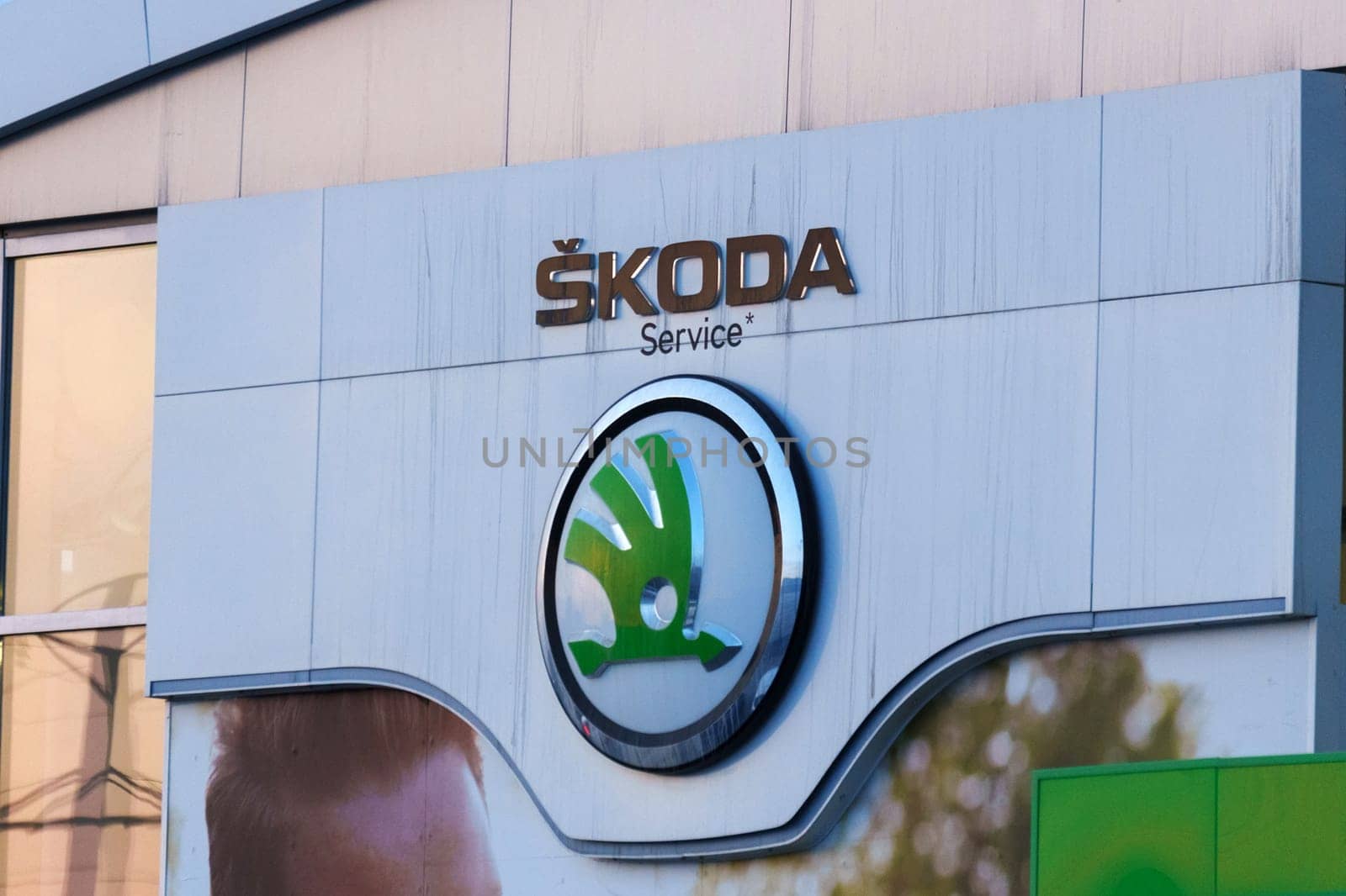 Tyumen, Russia-March 18, 2024: Skoda logo car advertisement on its side, showcasing the brands logo and vehicle model. by darksoul72