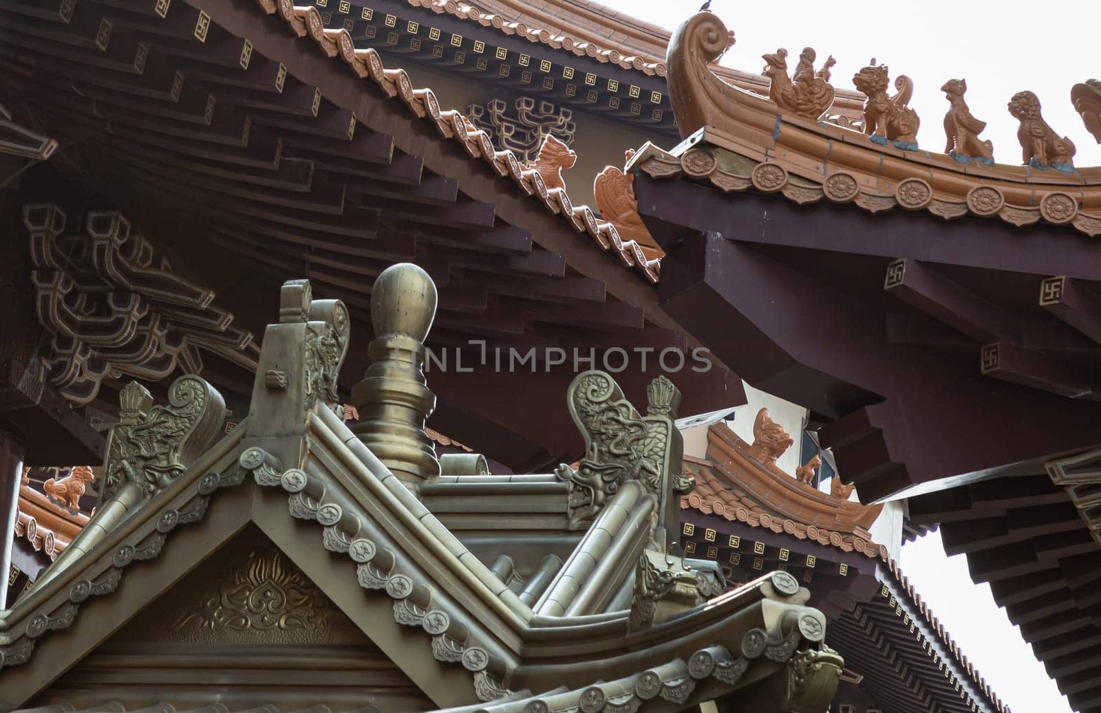 Bangkok, Thailand - Apr 11, 2024 - Golden gable roof architecture inside of Taiwanese temple at Fo Guang Shan Thaihua Temple. Taiwanese temple style, The Institute of Buddhism, Space for text, Selective focus.