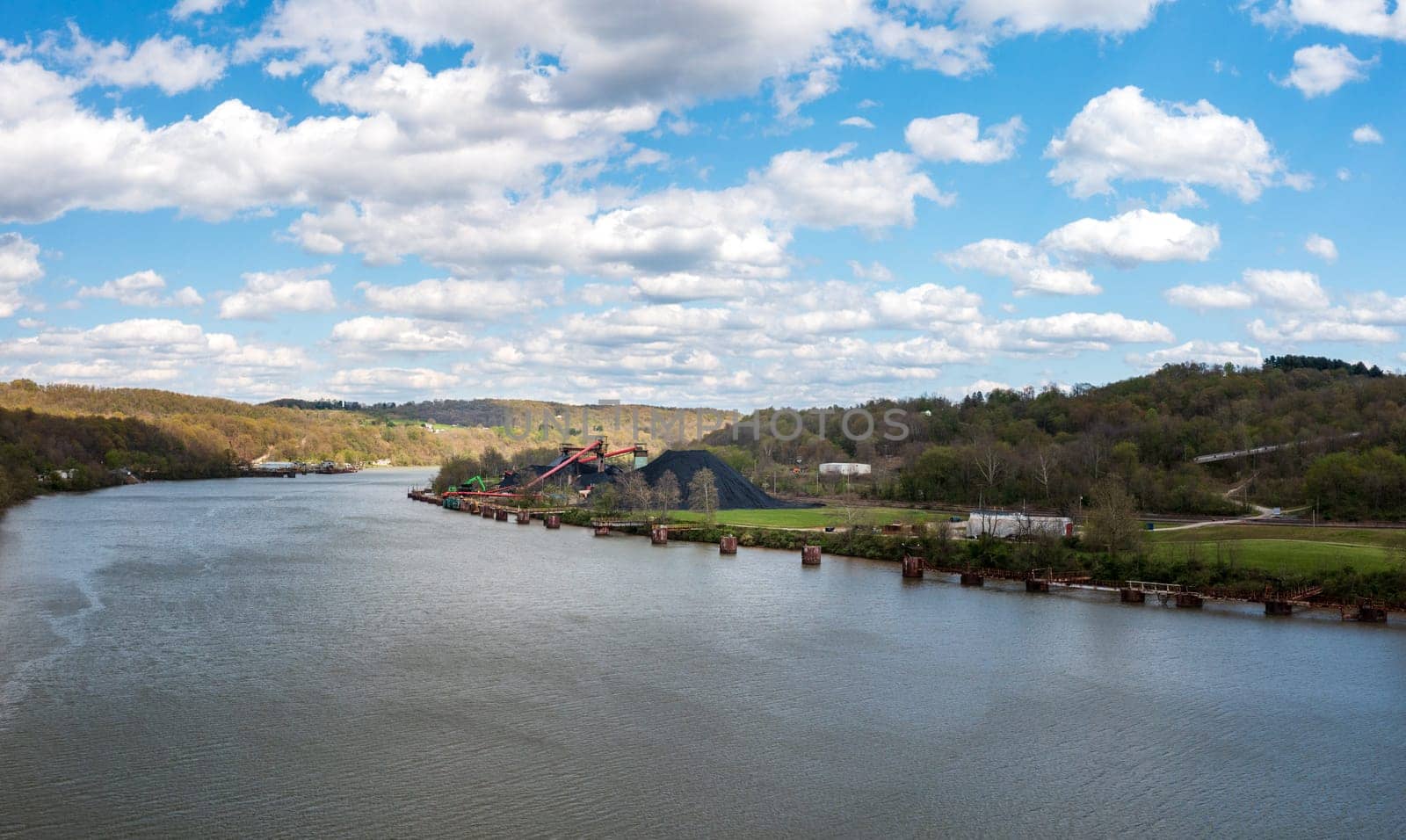 Coal piled by the Monongahala river by Vestaburg in Pennsylvania by steheap