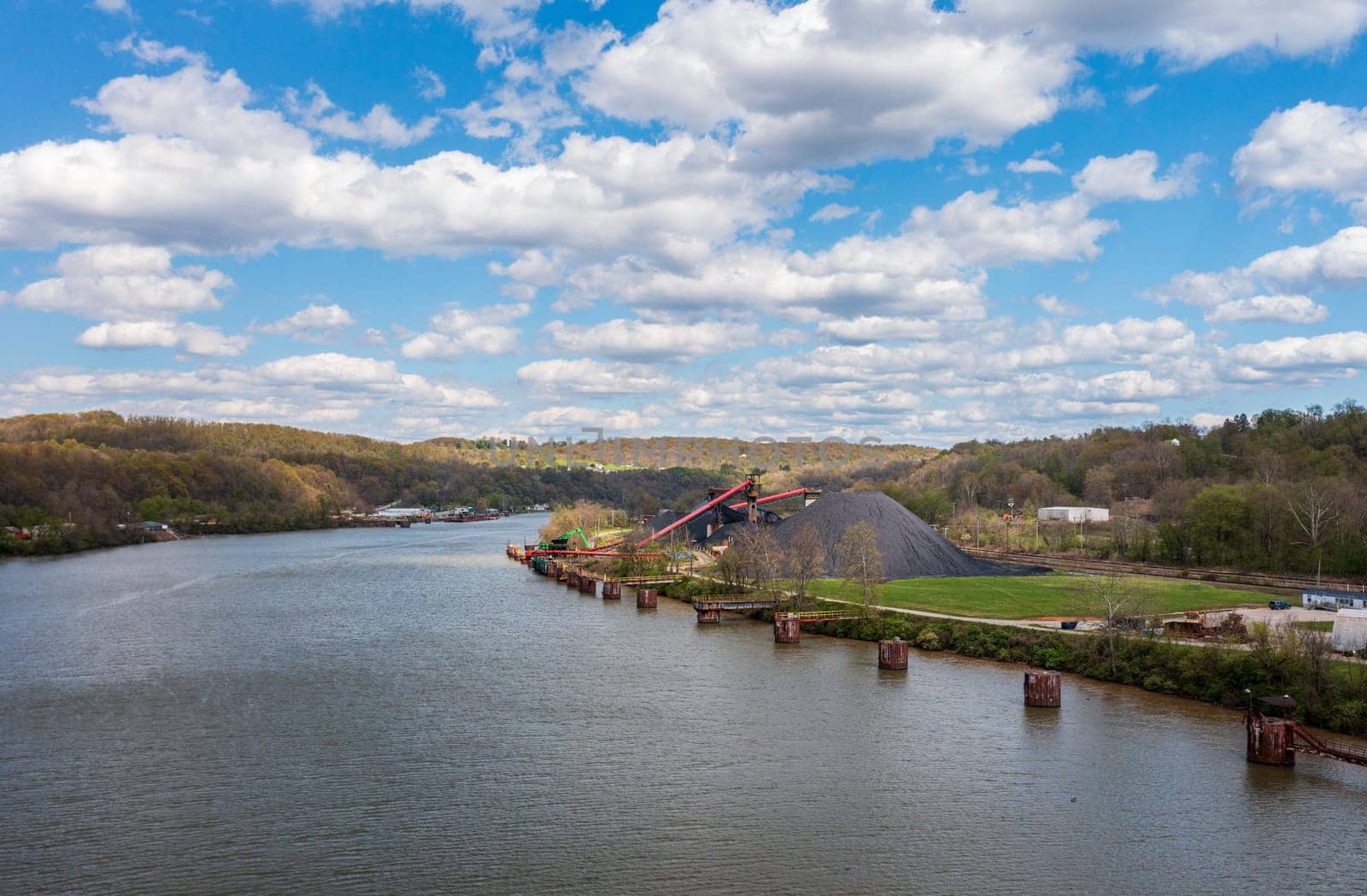 Coal piled by the Monongahala river by Vestaburg in Pennsylvania by steheap