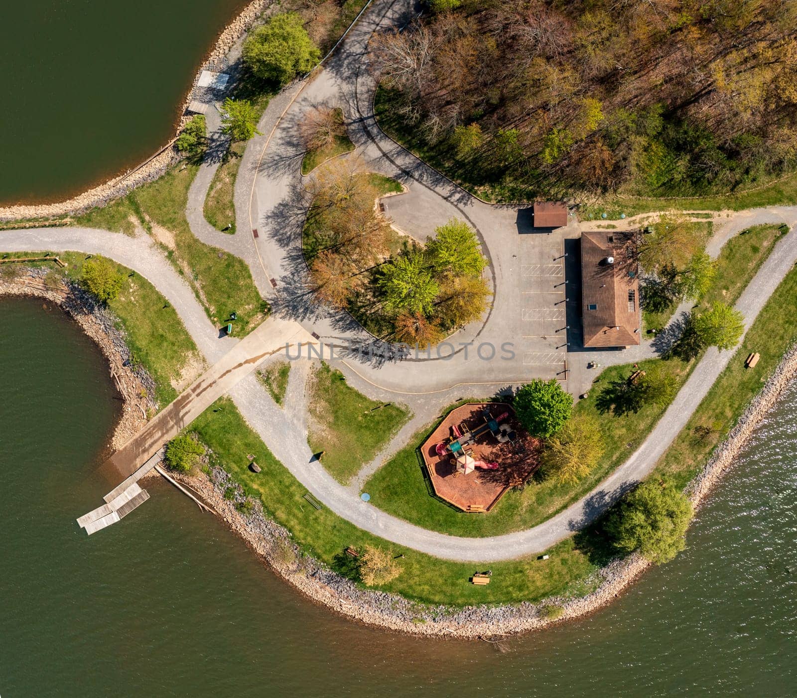 Aerial view looking straight down on the childrens play park at Cheat Lake Park near Morgantown West Virginia on a beautiful calm spring morning