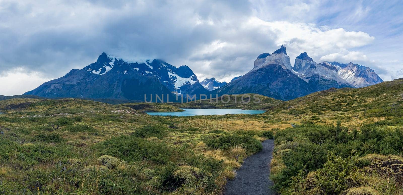 Scenic Path Leading to a Turquoise Mountain Lake by FerradalFCG