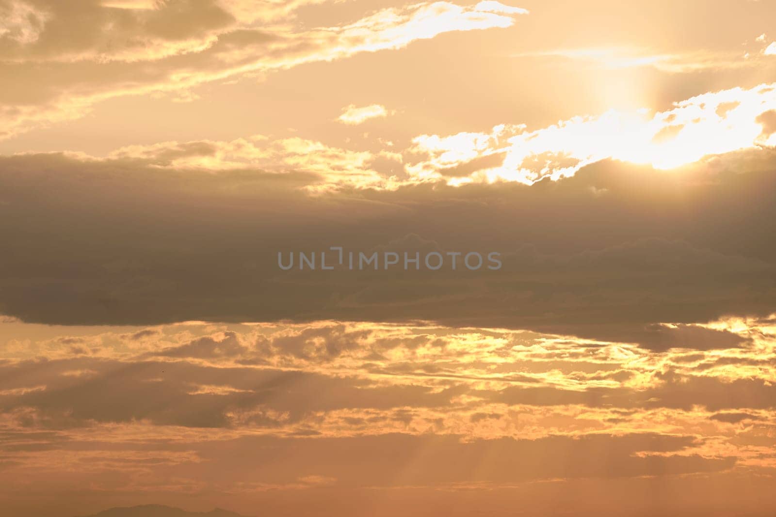 Evening sun over the clouds, orange colours by raul_ruiz