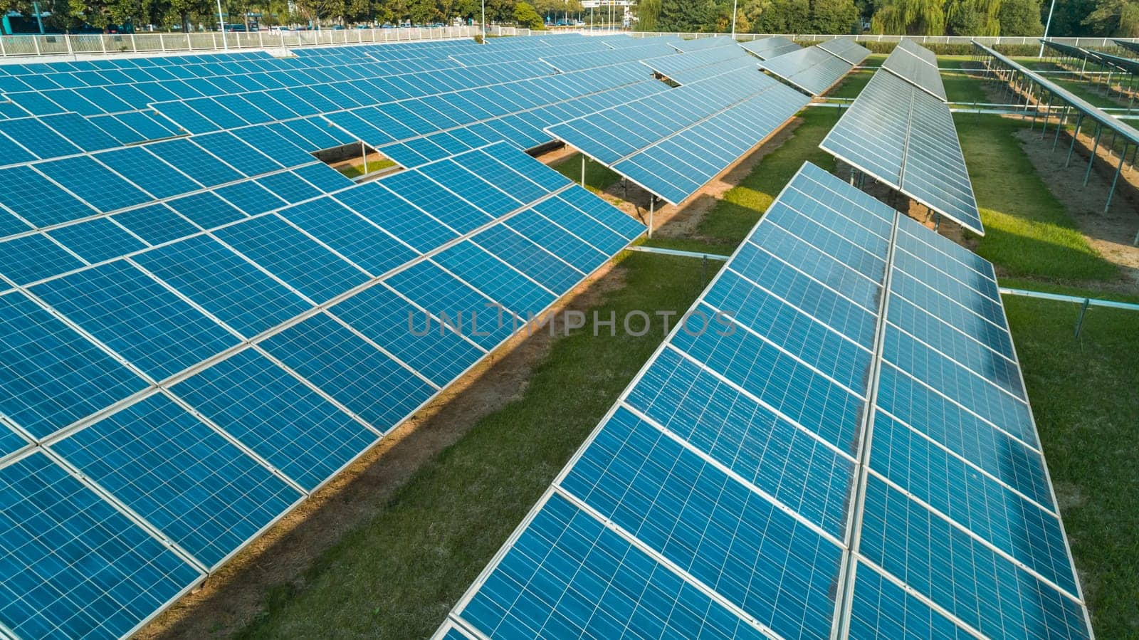 Aerial view of solar energy panels, solar panels, Solar power plants. by Busker