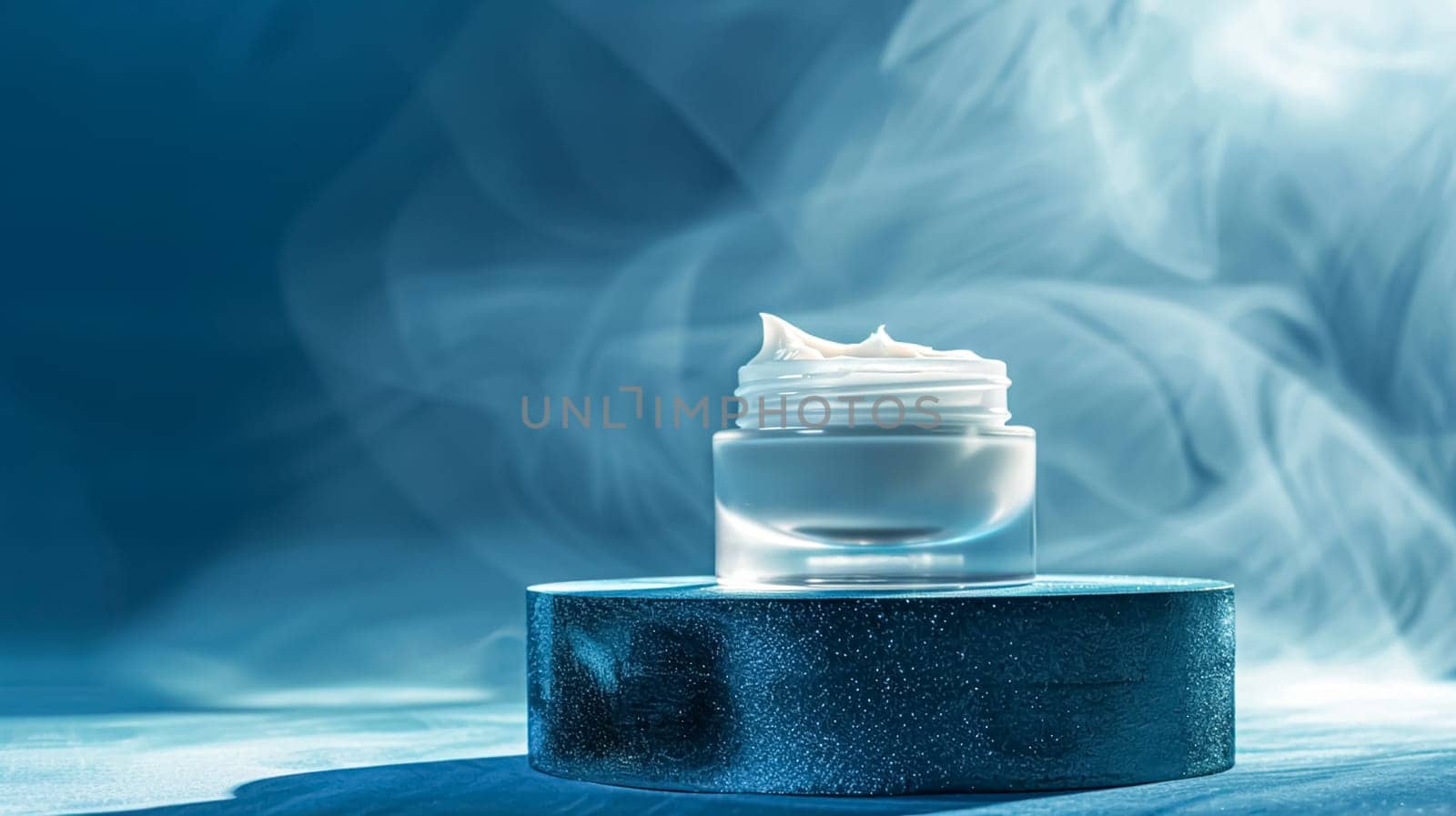 Cosmetic cream in a glass jar on a blue backdrop. Skin care concept. Background for beauty products