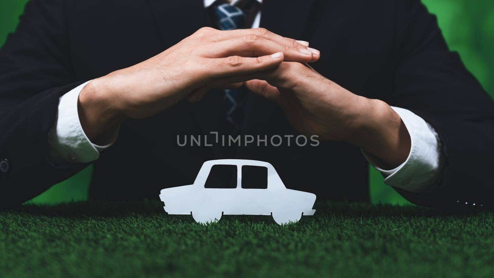 Businessman holding EV car icon symbolize eco-friendly business corporation committed to environmentally friendly transportation and zero CO2 emission. Corporate responsible and EV technology. Gyre