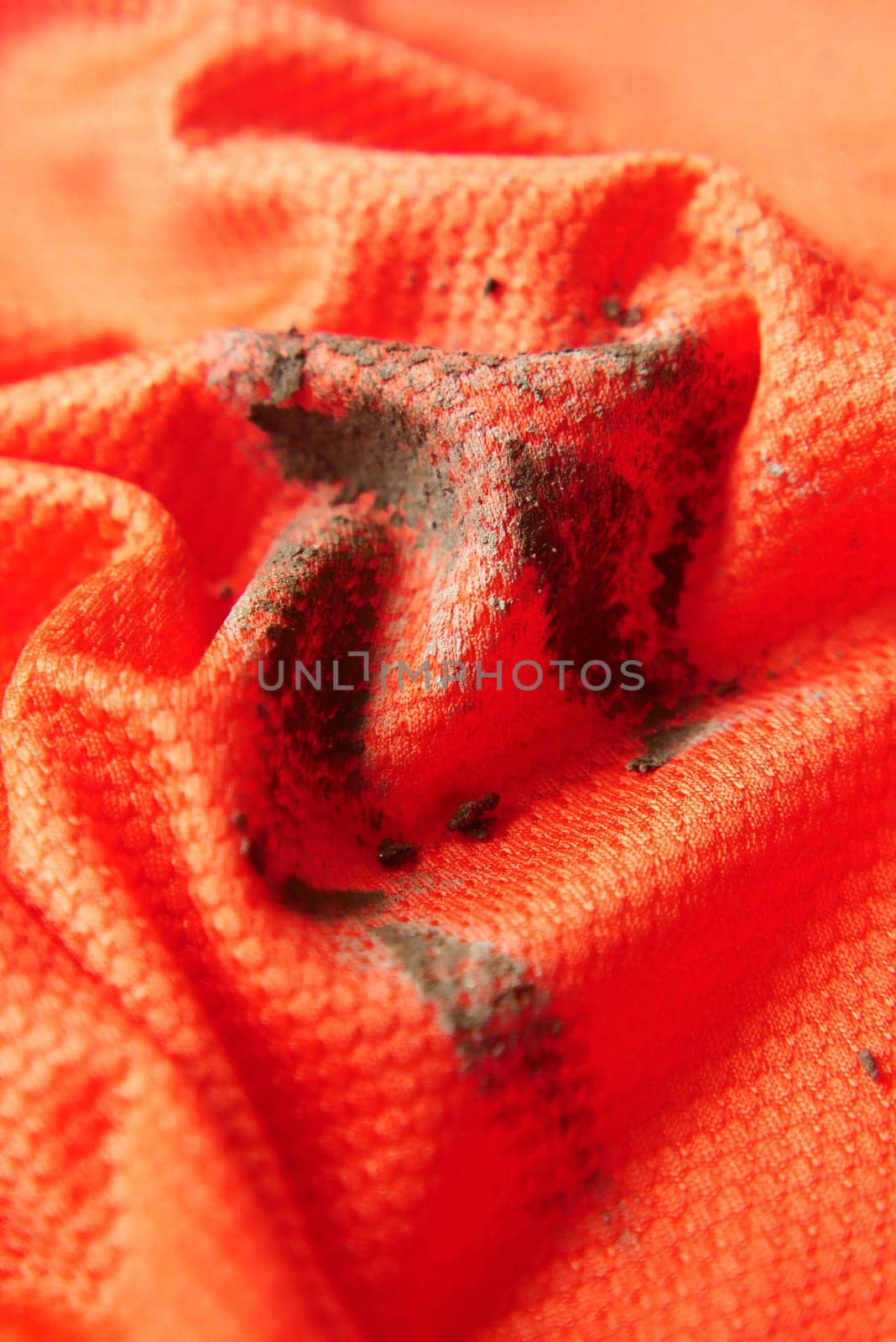 orange color cloth stain closeup by towfiq007