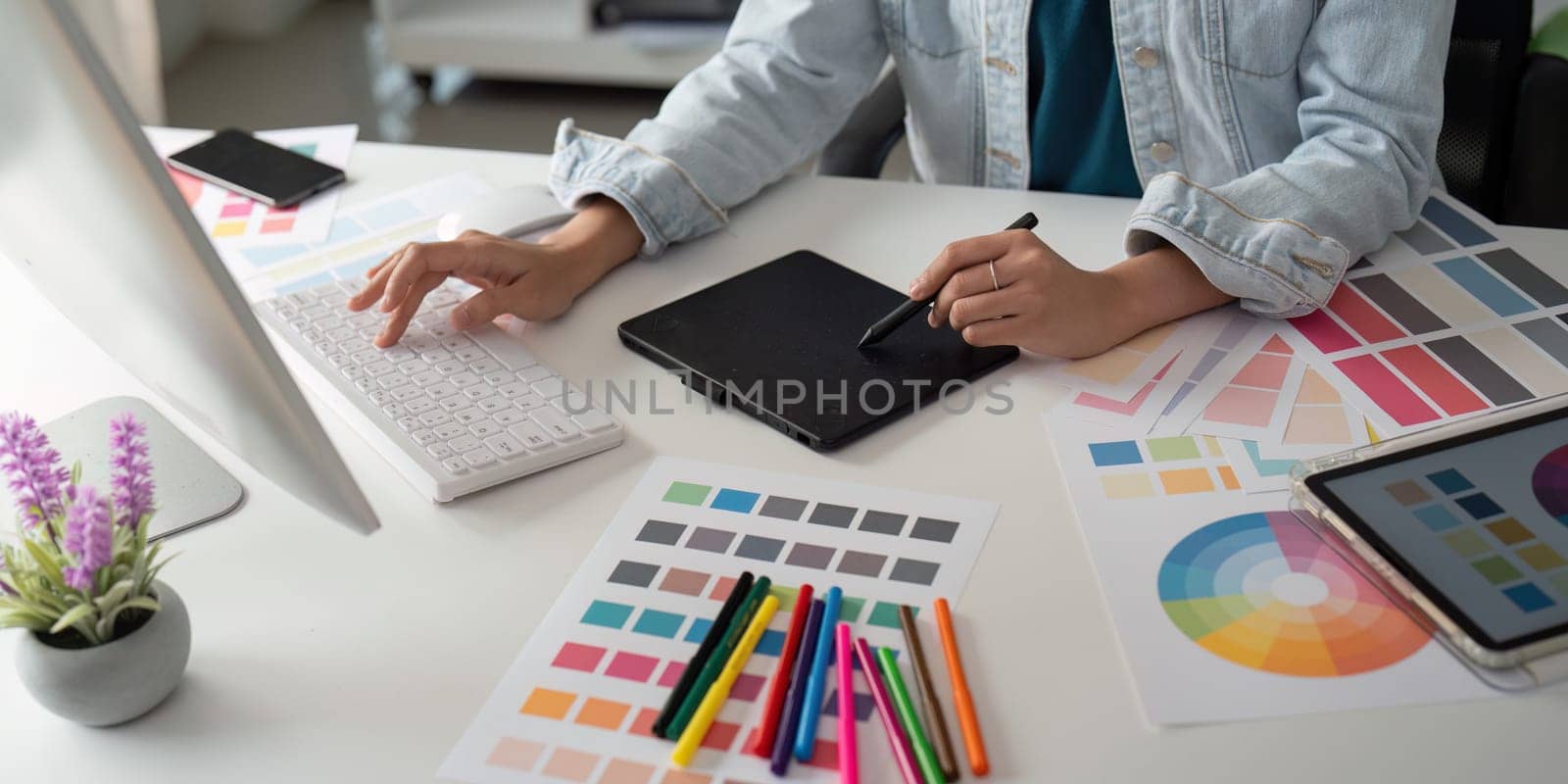 Asian woman graphic designer working in home office. Artist creative designer illustrator graphic skill concept by nateemee