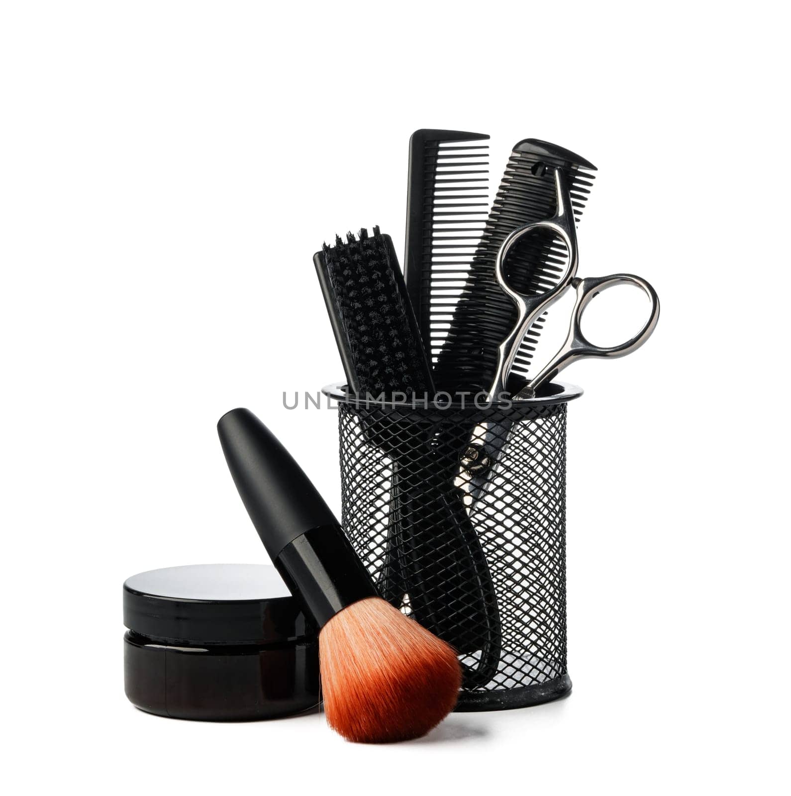 Professional hairdresser tools in cup isolated on white background