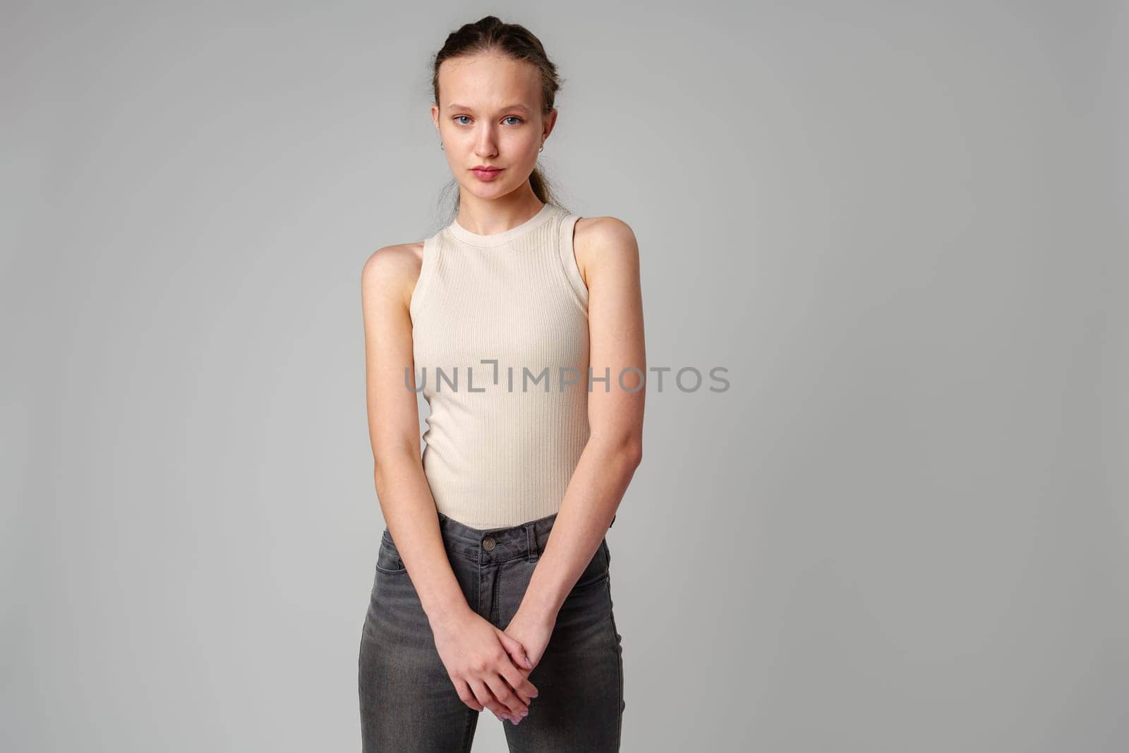 Young Girl With Long Curly Hair Portrait in studio