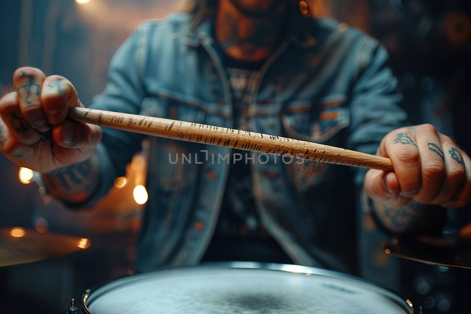 Close-up of a drumstick over a drum in the hands of a drummer. Live music concept. Generative AI by Vovmar