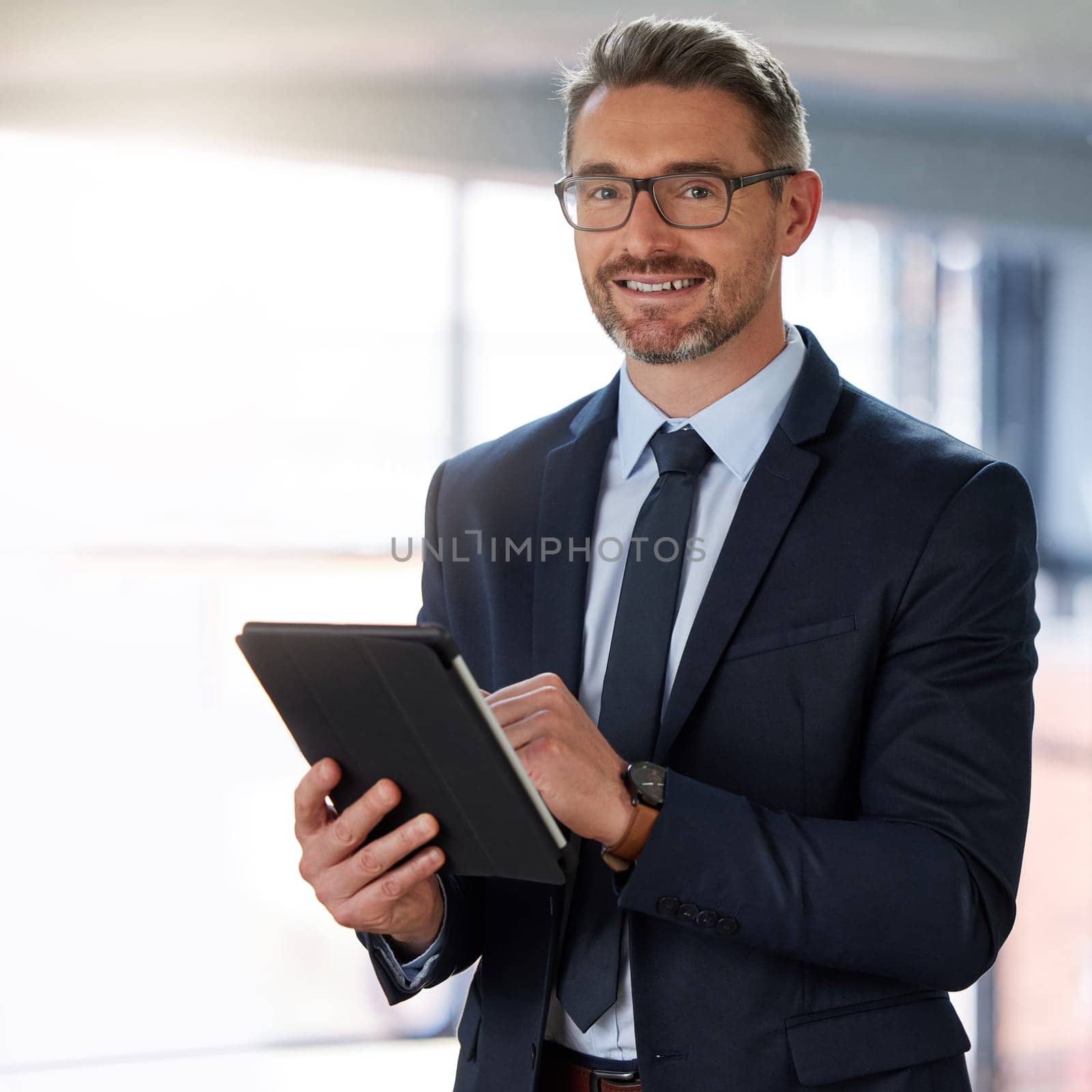 Professional, businessman and tablet in office or portrait for planning, schedule and research for company growth. Male person, smile and digital technology with manager for project development.