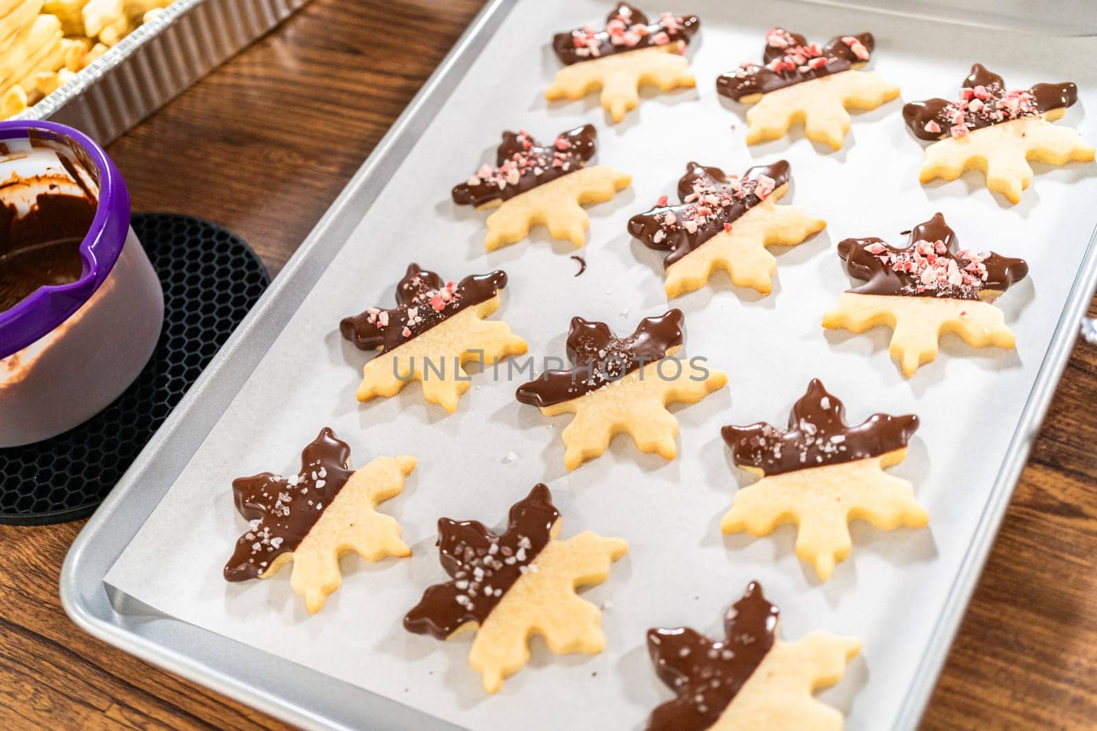 Making Star-Shaped Cookies with Chocolate and Peppermint Chips by arinahabich