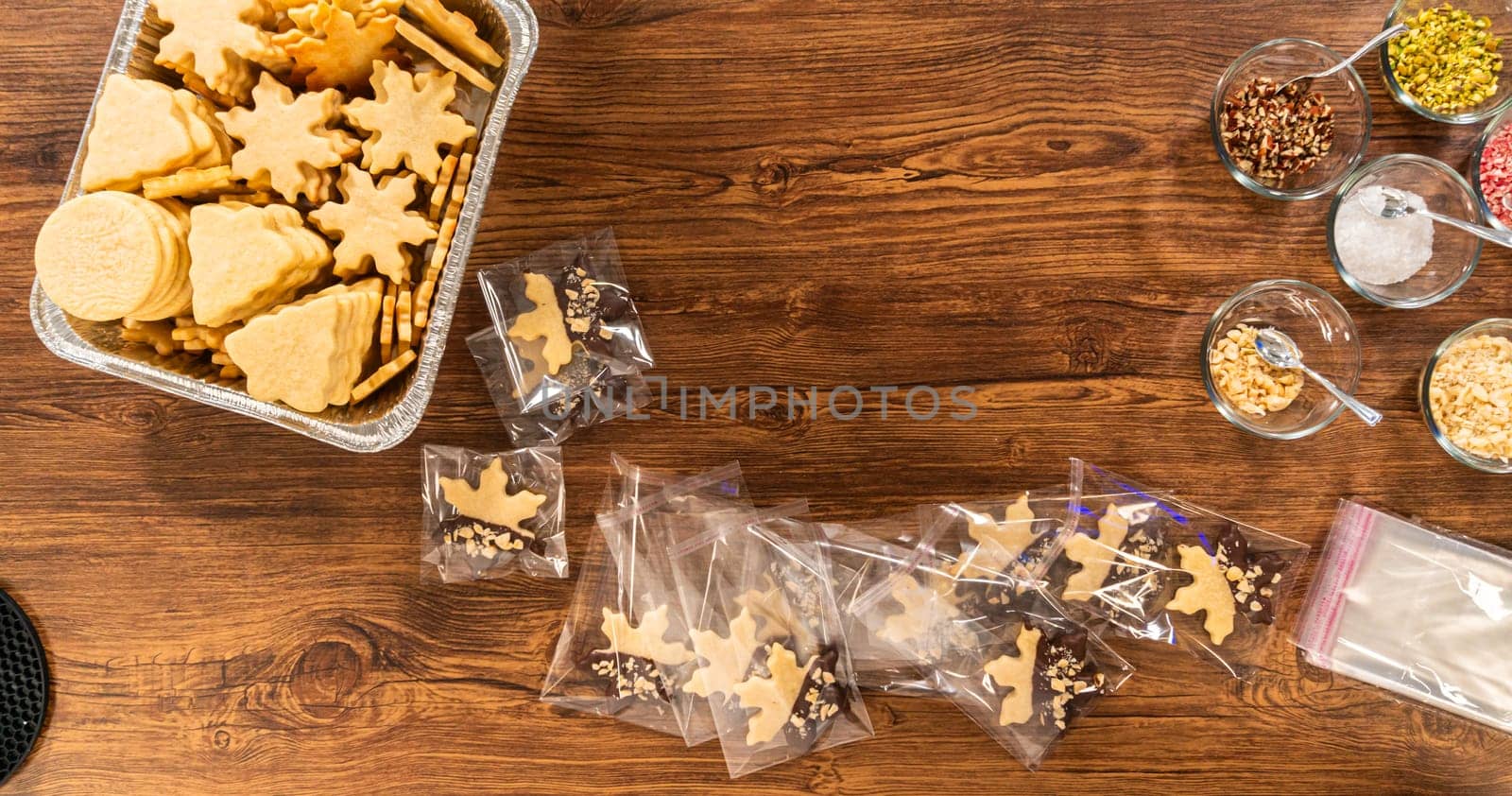 Christmas Cutout Cookies Dipped in Chocolate, Nut-Topped, Neatly Packaged by arinahabich