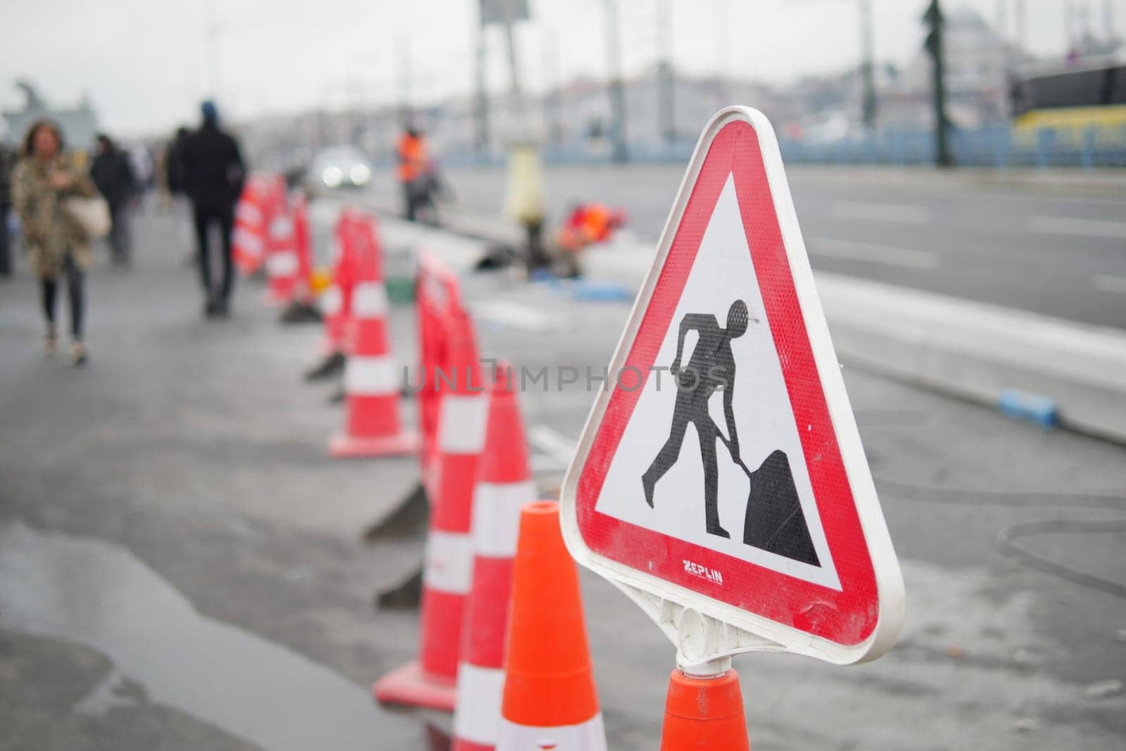 traffic sign on street with construction site by towfiq007