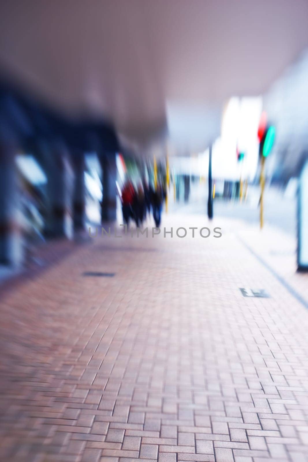 City, blur and people in street walking for commute, travelling and journey in urban town. Population, community motion and crowd of men and women on crosswalk, road and sidewalk for destination.