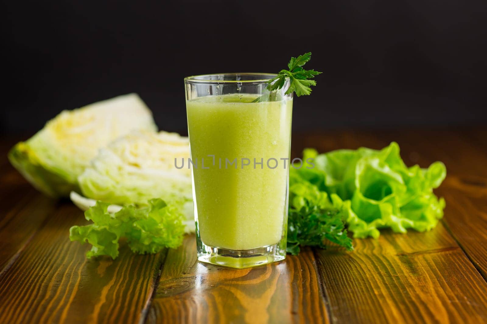 vegetarian smoothie made from green vegetables, cabbage, lettuce, greens .