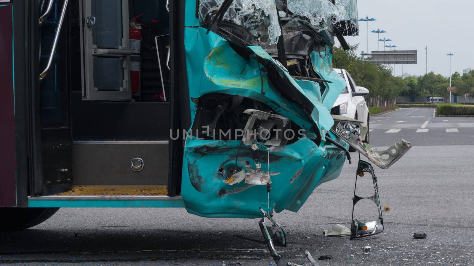 Close-up view of road accident. Passenger bus crasshed.