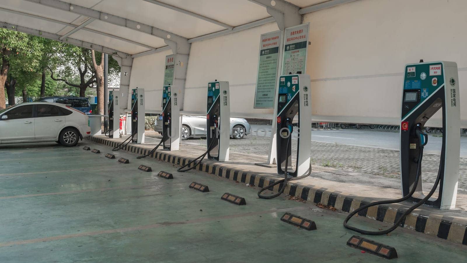 16 August, 2018. Suzhou city, China. Power supply for electric car charging. Electric car charging station. by Busker