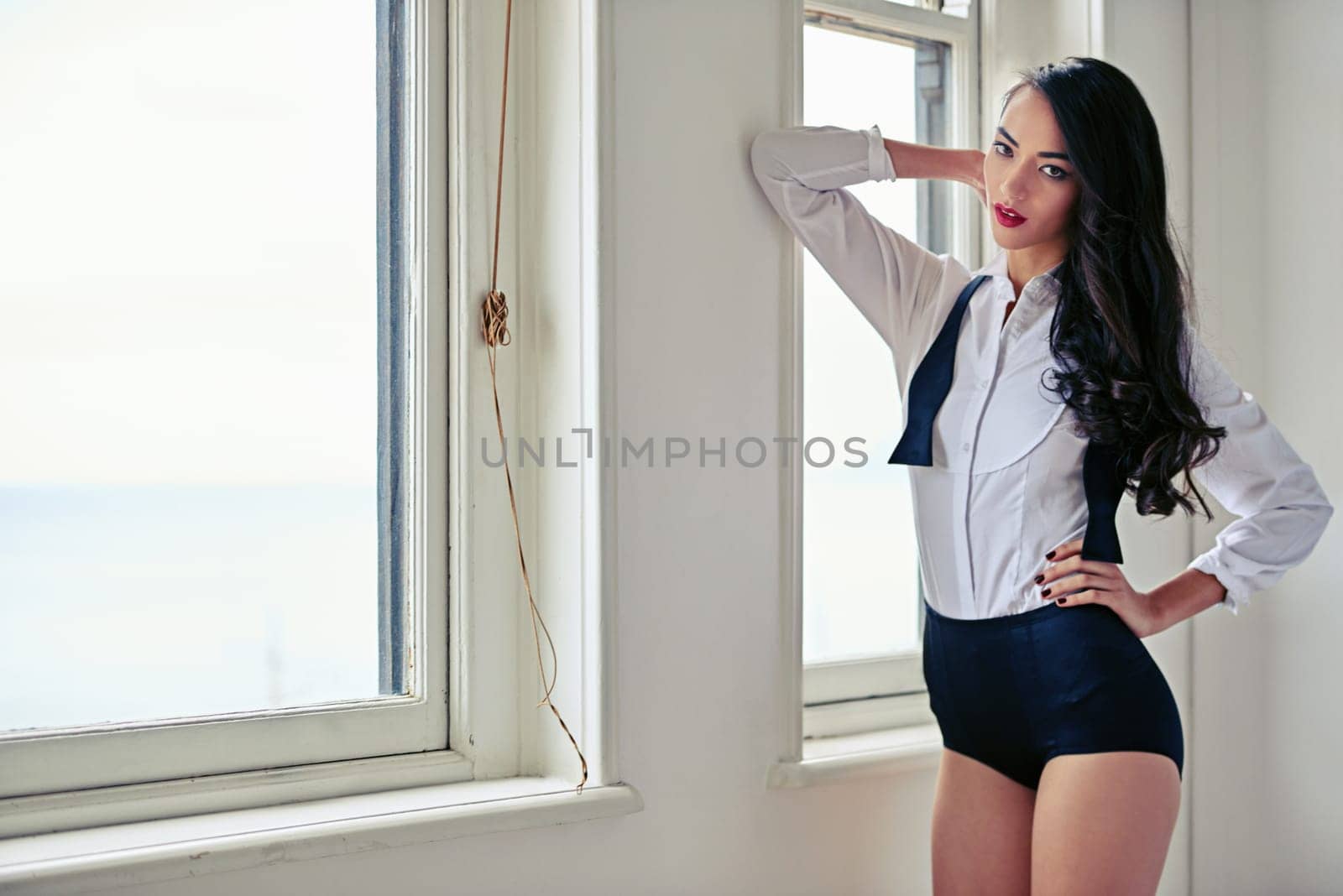 Undressing, woman and dancer portrait with classic, dress shirt and formal fashion in a dance studio. Confidence, home and window with elegance and classy style for performance and tap practice.