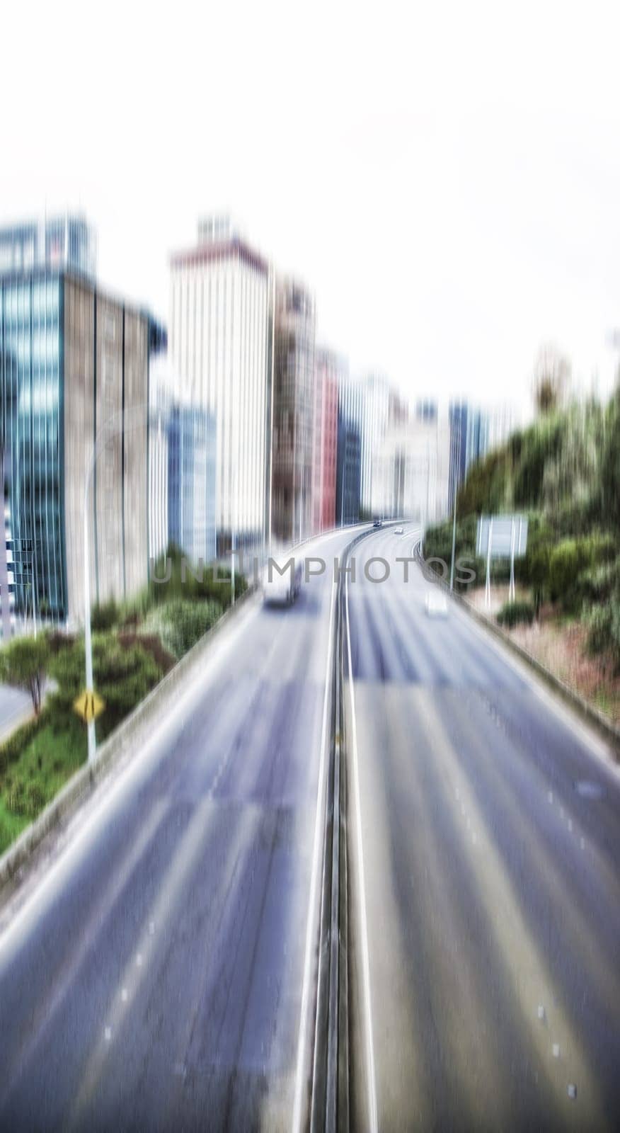 City, blur and motion with urban, abstract and street for New York cityscape and architecture. Manhattan, background and metropolitan backdrop for speed, transportation and highway road downtown by YuriArcurs