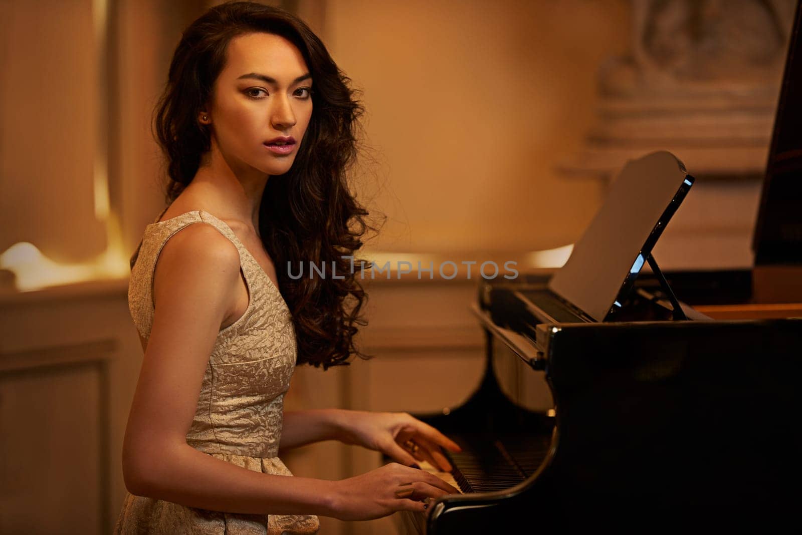 Mansion, woman and piano with portrait, home and pianist in a ballroom with luxury instrument. Musician, palace and vintage fashion of sound artist with song and playing with glamour and style.