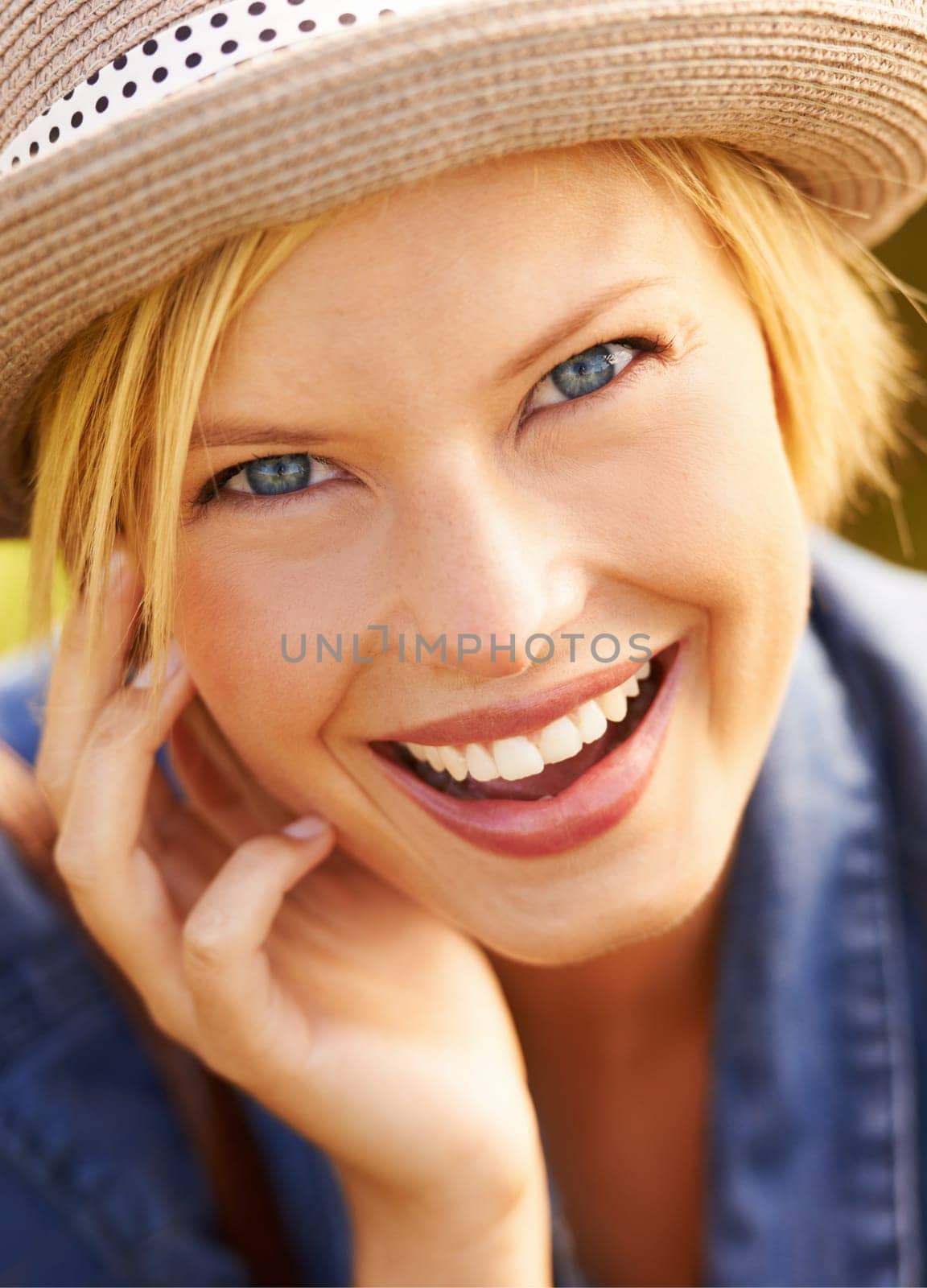 Face, happiness and young woman outdoor for summer, travel and leisure to relax with positivity. Closeup, portrait and smile with holiday, confidence and joy in the sun for adventure with wellness by YuriArcurs