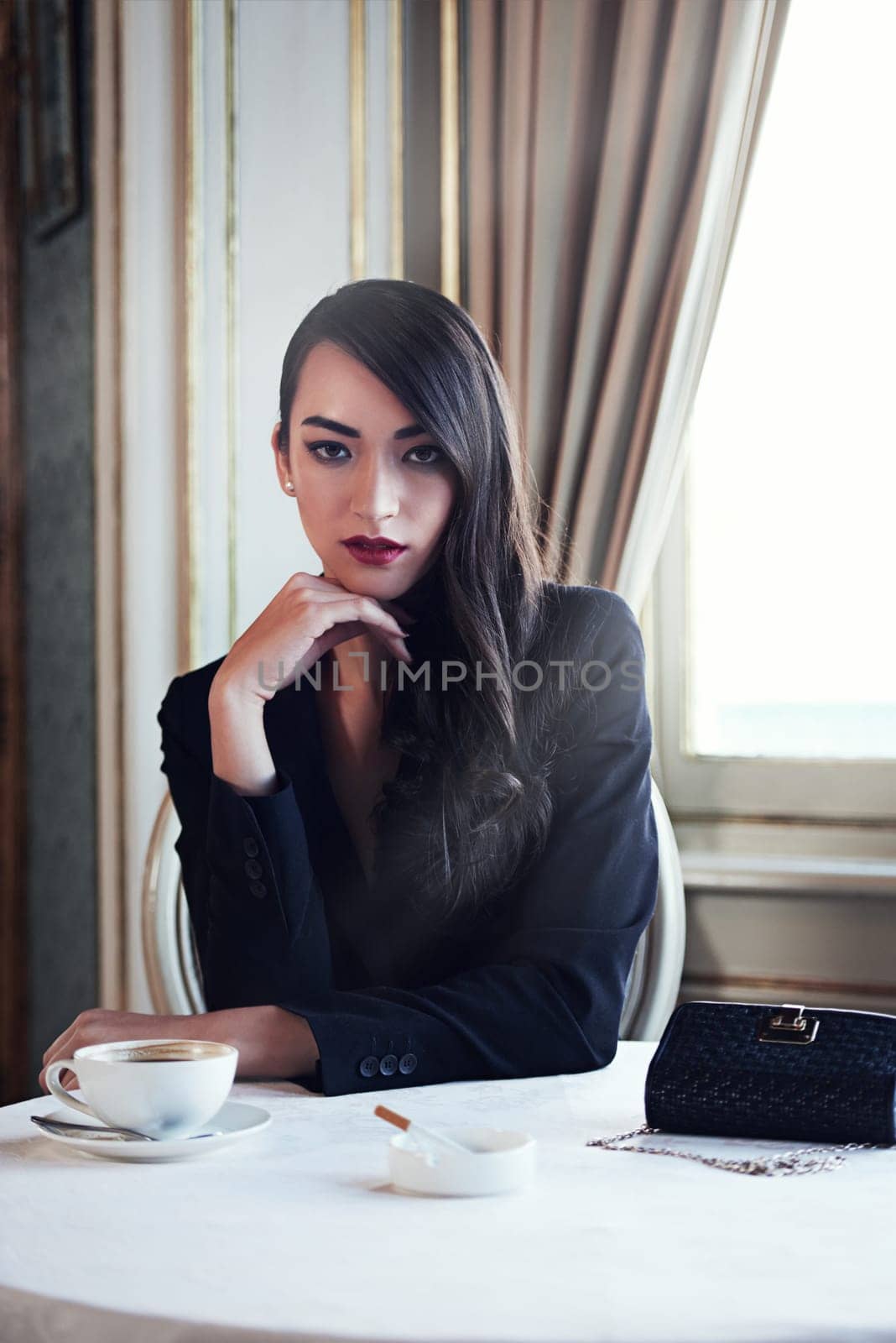 Portrait coffee and woman with cigarette, restaurant and luxury with break, mob wife and boss lady. Face, person or vintage fashion with girl in cafe, rich or wealthy with confident gangster or hotel.