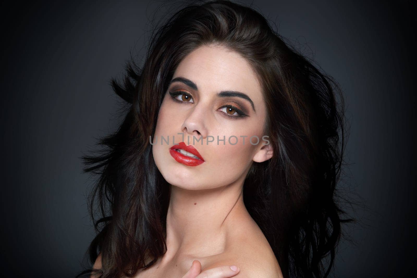 Beauty, cosmetics and portrait of woman on black background for wellness, skincare and makeup. Cosmetology, dermatology and face of person with lipstick, confidence and salon aesthetic in studio.