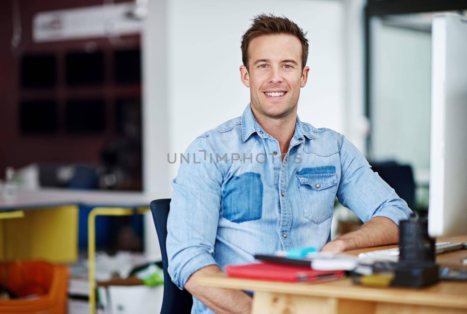 Portrait, smile and creative business man in office at startup, company or workplace for career in Germany. Happy professional, entrepreneur and face of confident employee, worker or designer at job.