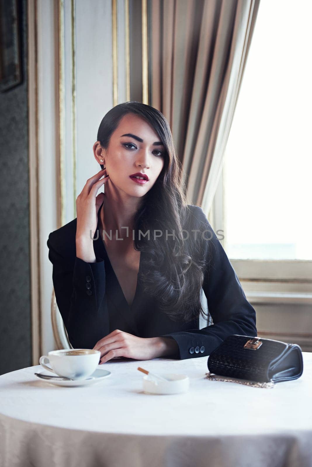 Portrait coffee and woman with cigarette, cafe or luxury with mob wife, elegant lady or gangster. Face, person or vintage fashion with crime boss, rich or criminal with confidence or hotel with mafia by YuriArcurs