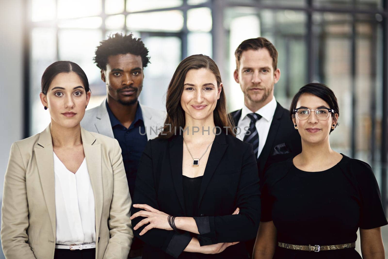 Business people, portrait and group with teamwork, diversity and cooperation with corporate professional. Legal aid, attorney and lawyer in modern office, confidence and collaboration with support by YuriArcurs