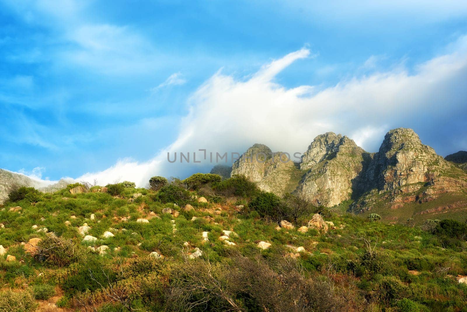 Blue sky, clouds and hill at countryside for environment, sustainability and summer sunshine. Nature, beauty and mountain with grass in daylight for eco friendly, green earth and growth in Norway.