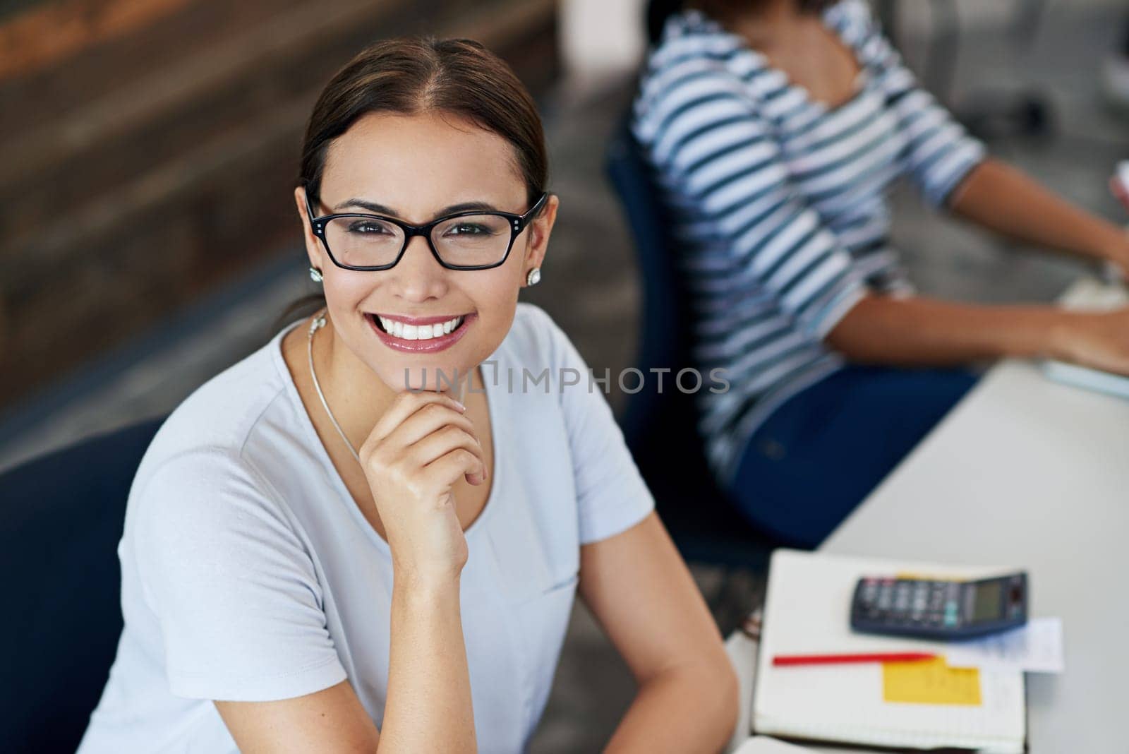 Finance, portrait and smile with accountant woman in boardroom of office for planning or wealth management. Audit, calculator and meeting with happy employee in workplace for growth or investment.