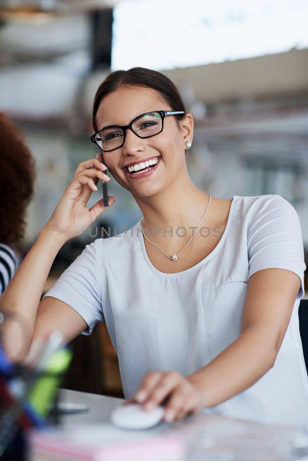 Office, phone call and woman with smile at desk for networking, communication and planning. Contact, discussion and journalist with smartphone at work for article review, feedback and good advice.