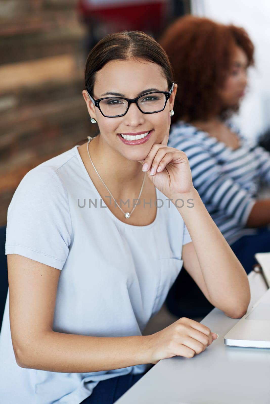 Woman, portrait and smile in office for accounting, job and career in finance. Female person, accountant or auditor and confident at table for financial agency, employment or business meeting by YuriArcurs