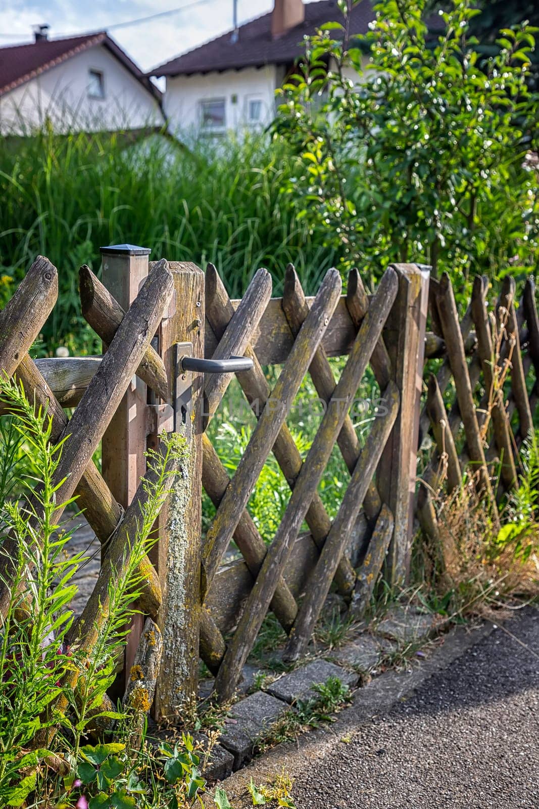 Simple Handmade wooden fence. Vertical view