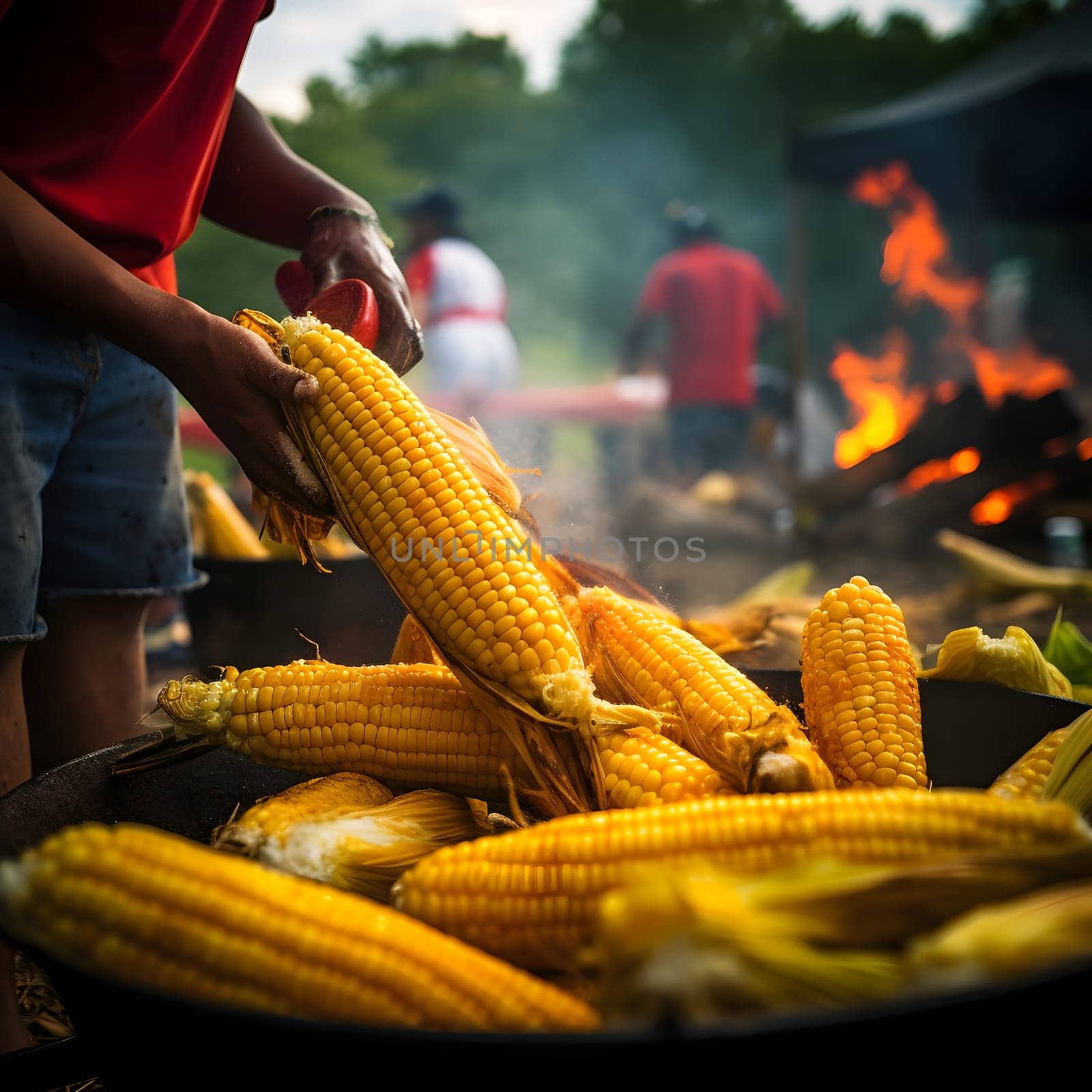 A large metal bowl with cobs, corn and a man and receiving. Corn as a dish of thanksgiving for the harvest. An atmosphere of joy and celebration.