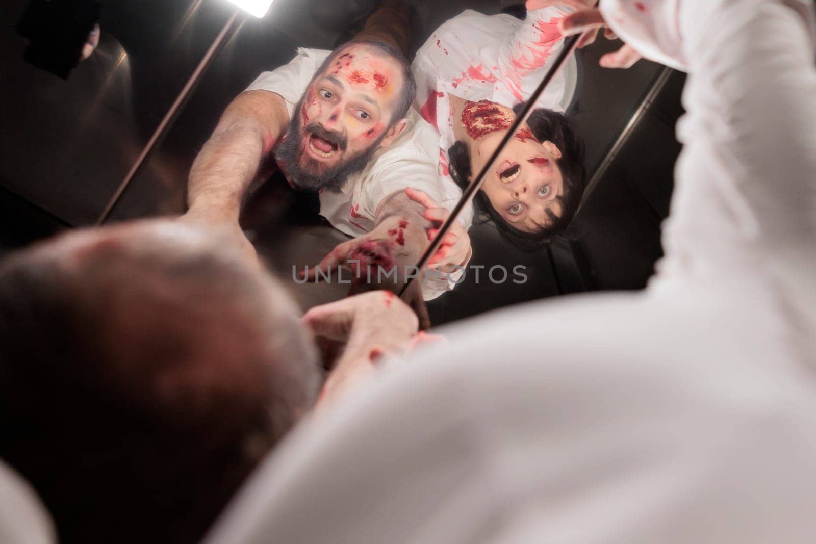 Zombies filled with blood and scars stuck in escalator during apocalypse by DCStudio