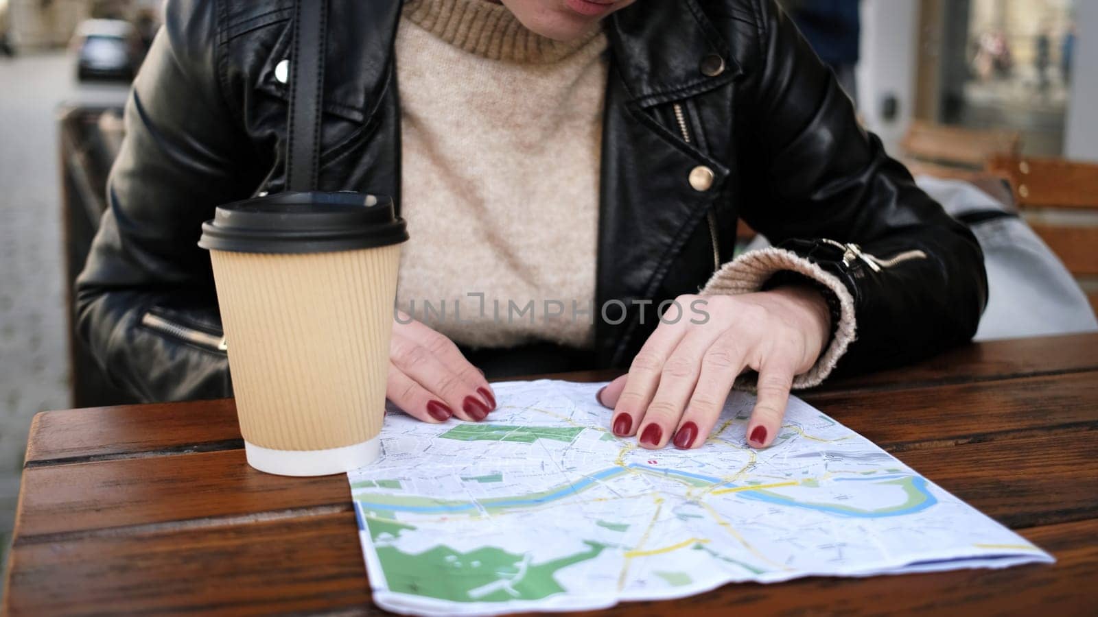 Stylish Female Tourist Checks City Sightseeing Route On Map by GekaSkr