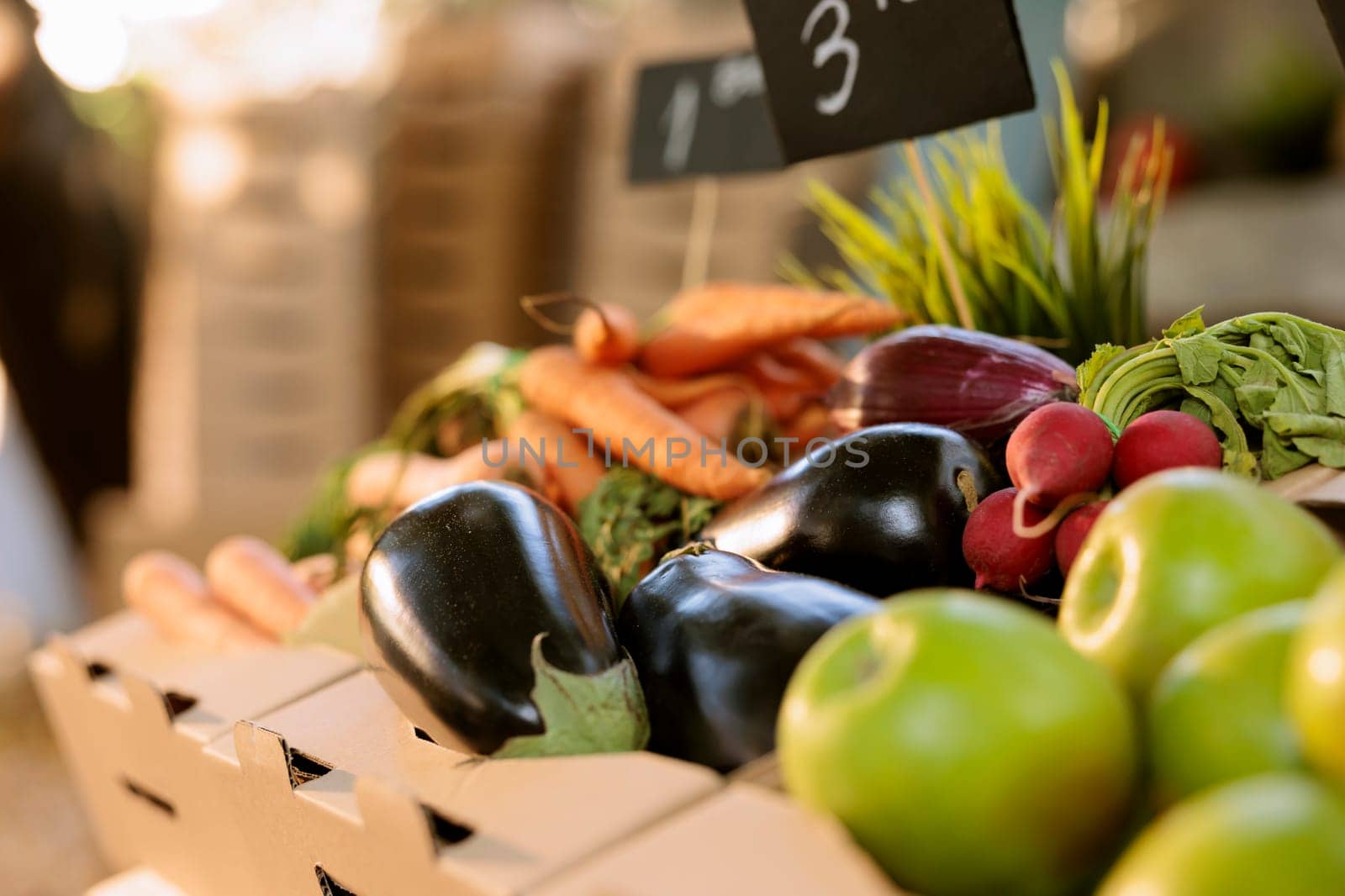 Fresh vegetables on farmers market stand by DCStudio